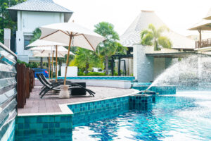 Resort pool with lounge chairs