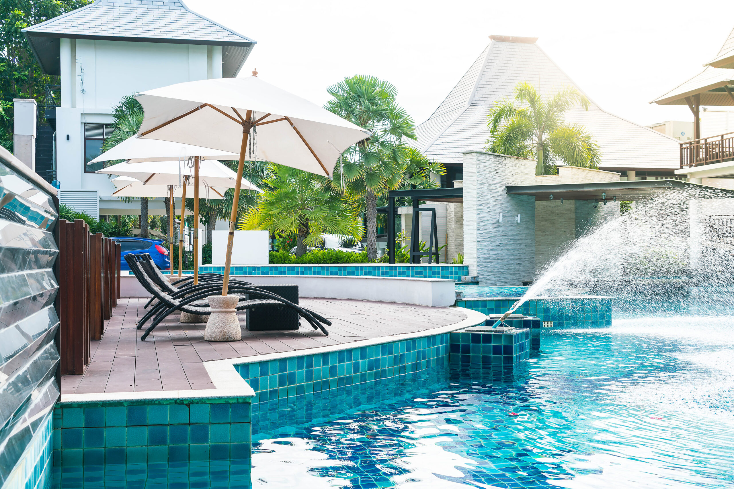 Resort pool with lounge chairs